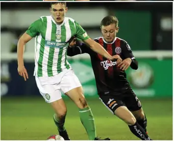  ??  ?? Luka Lovic of Bray Wanderers holds off Conor Levingston of Bohemians.