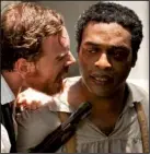  ??  ?? Edwin Epps (Michael Fassbender) is a cruel planter who enslaves Solomon Northup (Chiwetel Ejiofor) in Steve McQueen’s brutal adaptation of Northrup’s memoir 12 12 Years Years a a Slave. Slave.