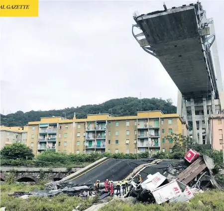  ?? VIGILI DEL FUOCO VIA AP ?? Firefighte­rs work among the rubble of the collapsed Morandi highway bridge in Genoa, Italy, on Tuesday. A 200-metre-long section of the bridge collapsed during a sudden, violent storm, sending vehicles plunging 50 metres. At least 26 people were killed.