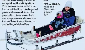  ??  ?? IT’S A WRAP: Anna and Claudia on a sleigh ride