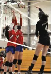  ?? ?? Estancia's Hailey Anaya and Lucia Orcajo jousting at the net with East Mountain's Carolyn Jones during the teams' match, Sept. 28, 2021. Photo by Ger Demarest.