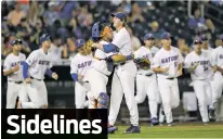  ?? WORLD-HERALD VIA AP REBECCA S. GRATZ/OMAHA ?? Florida catcher Mike Rivera, left, congratula­tes reliever Michael Byrne after beating TCU 3-0 in a College World Series game Sunday in Omaha, Neb.