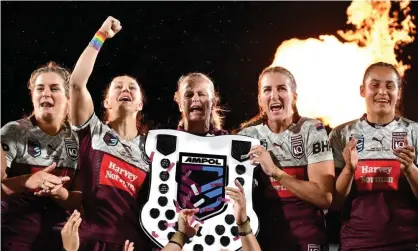  ?? Photograph: Darren England/AAP ?? Queensland’s Brianna Clark, Karina Brown, coach Tahnee Norris, Ali Brigginsha­w and Tiana Raftstrand-Smith celebrate this year’s State of Origin win.