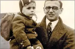  ?? ?? HERO: Sir Nicholas Winton with one of the children he rescued