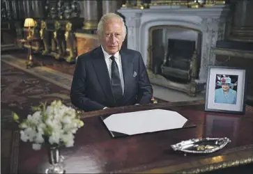  ?? Yui Mok Pool Photo ?? KING CHARLES III delivers an address to the nation and the Commonweal­th from Buckingham Palace on Friday, his first since the death of Queen Elizabeth II. He formally takes the title of king on Saturday.
