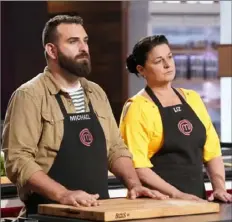  ?? Greg Gayne/ Fox ?? A tag- team challenge with Michael Silverstei­n and Liz Linn did not go well on “MasterChef.”