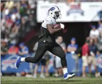  ?? ADRIAN KRAUS - THE ASSOCIATED PRESS ?? Buffalo Bills running back LeSean McCoy runs with the ball during practice at the NFL football team’s training camp in Pittsford, N.Y., Thursday, July 25, 2019.