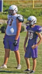  ?? STAFF PHOTO BY DOUG STRICKLAND ?? Central offensive lineman Wyatt Garrett, left, stands next to teammate Hunter Jones during practice this week. Garrett’s size was a liability in the past, but he has worked to get in much better shape this year.