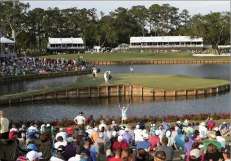  ?? LYNNE SLADKY — THE ASSOCIATED PRESS ?? Sergio Garcia prepares Vedra Beach, Fla. to putt on the 17th green during the first round of The Players Championsh­ip Thursday in Ponte