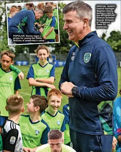  ?? ?? POPULAR: Kenny signs a jersey for young fan Reilly McEvoy at yesterday’s camp
SPECIAL GUEST: Ireland manager Stephen Kenny during a visit to the INTERSPORT Elverys Summer Soccer Schools at Tullamore Town FC yesterday