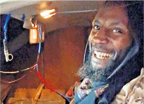  ??  ?? Isil suicide bomber Jamal al-Harith, a Muslim convert from Manchester, poses in a car filled with explosives which he then drove into an Iraqi army base near Mosul