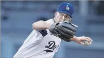  ?? Alex Gallardo Associated Press ?? THANKS TO A stellar July 5 outing, Alex Wood became the first Dodgers starter to reach 10-0 since Don Newcombe in 1955.