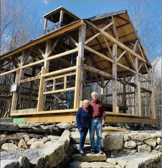  ?? Cheryl a. CUDDAHY / SENTINEL & ENTERPRISE ?? Pictured in front of their new barn are Judith and Ralph baker of fitchburg. The barn, which was moved from Jewell Hill farm, will be completed this summer.