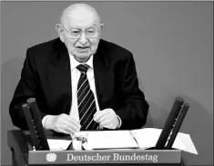  ?? — File photo by The Associated Press/Michael Sohn ?? This 2012 file photo shows Holocaust survivor Marcel Reich-Ranicki speaking during a Holocaust hour of remembranc­e at the German Federal Parliament, Bundestag, in Berlin.