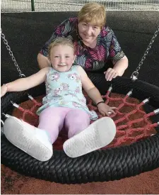  ??  ?? Charley and grandmum Mary Fitzgerald enjoying time out at Millstreet Playground. Picture John Tarrant