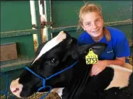  ?? FILE PHOTO ?? Ruthie Nolan, 14, of Kenyon Hill Farm in Shushan shows her cow some tender loving care at the 2018Washin­gton County Fair.