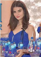  ??  ?? Fiji Water girl Kelleth Cuthbert.