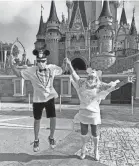  ?? CAROL AND STEVE SHOW ?? Steve and Carol Show of Port St. Lucie celebrate their 44th wedding anniversar­y at Walt Disney World’s Magic Kingdom, which reopened to the public Saturday.