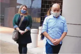  ?? KAREN WARREN/HOUSTON CHRONICLE VIA ASSOCIATED PRESS ?? Former Houston police officer Tam Pham leaves the federal courthouse in downtown Houston after he appeared in court. He was arrested Wednesday on federal charges tied to violence at the U.S. Capitol.