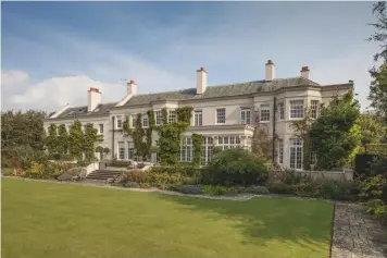  ??  ?? Top: Sutton Hall, Woodbridge, Suffolk, the ‘standout sale of the year’. £31.5m. Above: Aylesfield House, Hampshire, sold for more than its asking price of £11m