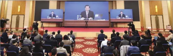  ?? CHEN ZHONGHAO / XINHUA ?? Zhang Yesui, spokesman for the fifth session of the 13th National People’s Congress, speaks to reporters at a news conference,via video link,on March 4 in Beijing.