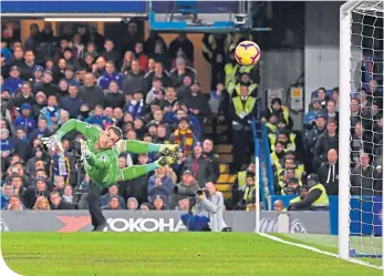  ??  ?? Newcastle keeper Dubravka is powerless to stop Willian’s magnificen­t effort