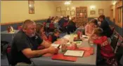  ?? CHARLES PRITCHARD — ONEIDA DAILY DISPATCH ?? Patrons enjoy themselves at the Munnsville American Legion on Wednesday, Feb. 14, 2018.