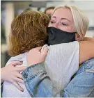  ?? ALDEN WILLIAMS/STUFF ?? Arrivals from Australia embrace at Christchur­ch Airport yesterday.