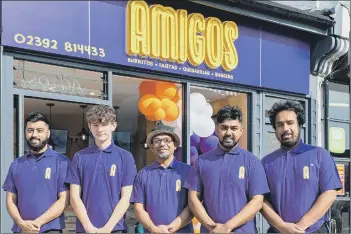  ?? Picture: Mike Cooter (230821) ?? MEET THE TEAM Staff at Amigos on Eastney Road. Saleh Choudhury, Alfie Flooks, chef Jamal Rahman, assistant manager Rafi Rahman and Hassan Rahman
