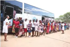  ?? ?? Women queue to be screened for cervical and breast cancer at an Angel of Hope Foundation mobile clinic during an outreach in Mbire yesterday