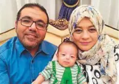  ?? Courtesy: Family ?? Baby Zaid with his parents. He was born weighing 2.7 kilograms with a rare congenital hernia condition of his liver and small intestine outside his abdomen.