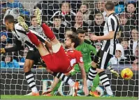  ??  ?? WINNER: Charlie Mulgrew scores late on to give Blackburn Rovers a priceless victory away at Newcastle