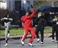  ?? (Arkansas Democrat-Gazette/Dale Ellis) ?? Members of the Pine Bluff High School Marching Band perform Monday during the 37th Annual Original KingFest Parade/March through downtown Pine Bluff in celebratio­n of the life and legacy of Martin Luther King Jr.