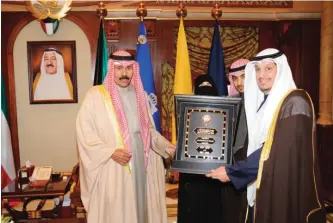  ??  ?? His Highness the Crown Prince Sheikh Nawaf Al-Ahmad Al-Jaber Al-Sabah receives a copy of the Public Authority for Youth’s strategy in Braille text.