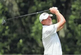  ?? ASSOCIATED PRESS ?? Madison’s Steve Stricker hits from the 18th tee en route to a 67 in the second round of the Memorial. He was five strokes off the pace.