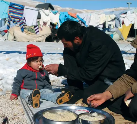  ?? AFP ?? Faced with extreme poverty, main and below, and mounting hostility, many displaced Syrians in Lebanon see onward migration, bottom, as their only option.