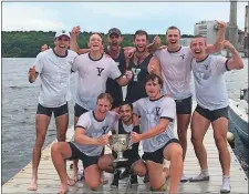  ?? GAVIN KEEFE/THE DAY ?? Members of the Yale varsity eight celebrate after winning the annual Yale-Harvard Regatta on Saturday on the Thames River. The race resumed after a two-year pause due to the COVID-19 pandemic.
