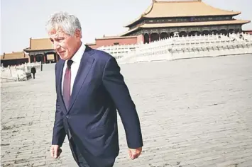  ??  ?? US Secretary of Defence Chuck Hagel tours the Forbidden City in Beijing. — Reuters photo