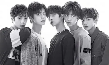  ?? — big Hit entertainm­ent ?? txt is big Hit’s first boy band after bts.