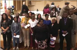  ?? Photo by Kendra Lolio ?? College scholarshi­p recipients from around Rhode Island gather for a group photo at the 35th annual Martin Luther King Jr. Scholarshi­p Breakfast.