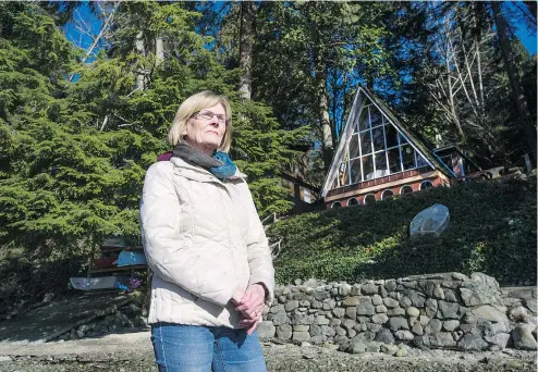  ?? JASON PAYNE/PNG ?? Nancy Strain of Coquitlam says she doesn’t know how her family will be able to pay the speculatio­n tax on the cabin her father built in 1963 in Belcarra. The cabin’s value is $26,500, but the land is worth $1.4 million.