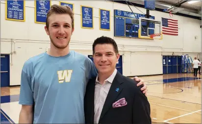  ?? MEDIANEWS GROUP PHOTO ?? Senior Connor Laverty and coach Chris Carideo of Widener after the Pride’s 92-71demoliti­on of Stevenson Saturday in MAC Commonweal­th basketball.