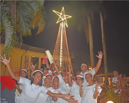  ?? Photo: Waisea Nasokia ?? Tanoa Internatio­nal Hotel staff members at the annual Christmas Tree lighting at the Tanoa Internatio­nal Hotel in Nadi, on November 28, 2022.