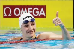  ?? — AFP ?? WINDSOR: Katinka Hosszu of Hungary reacts to her victory in the 400m Individual Medley final on day one of the 13th FINA World Swimming Championsh­ips (25m) at the WFCU Centre on Tuesday in Windsor Ontario, Canada.