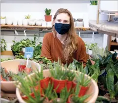  ?? CP PHOTO MICHAEL BELL ?? Owner Kait Waugh is shown at her store called the Fat Plant Farm in Regina.