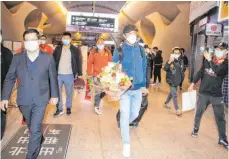  ?? FOTO: XIAO YIJIU/DPA ?? Nach einer dreimonati­gen Odyssee ist der FC Wuhan zurück.