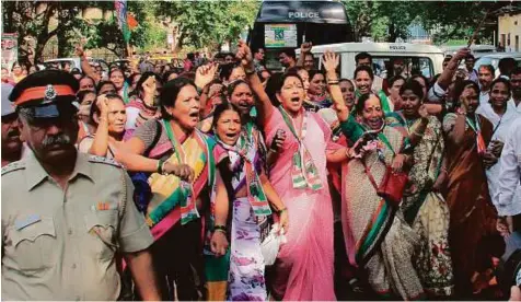  ?? PTI ?? Congress party workers try to enter the BJP offices as they protest against Prime Minister Narendra Modi over the Uri strike, in Mumbai yesterday.