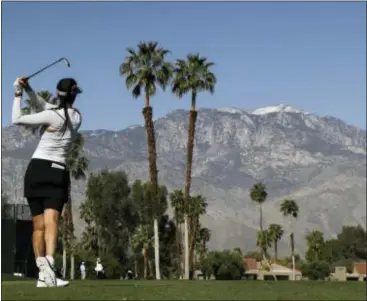  ?? CHRIS CARLSON — THE ASSOCIATED PRESS ?? Michelle Wie watches her tee shot on the fifth hole during the first round of the LPGA Tour ANA Inspiratio­n tournament at Mission Hills Country Club Thursday in Rancho Mirage, Calif.