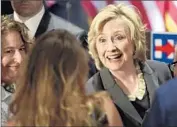  ?? Justin Lane European Pressphoto Agency ?? CANDIDATE Hillary Rodham Clinton greets supporters after a speech at New York University.