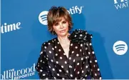  ?? MICHAEL TRAN/AFP/GETTY IMAGES/TNS ?? Actress Lisa Rinna arrives for the The Hollywood Reporter’s Women in Entertainm­ent Gala at the Fairmont Hotel in Los Angeles on Dec. 7, 2022. Rinna announced Thursday she is leaving the show “Real Housewives of Beverly Hills.”